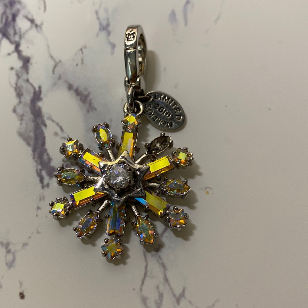 Retired juicy couture charm snowflake one stone missing